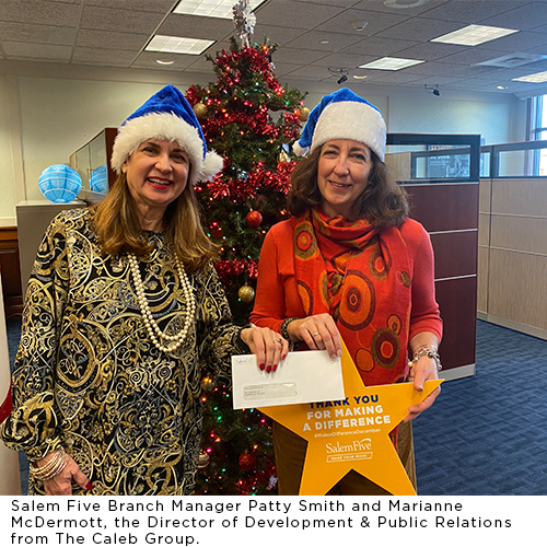 Salem Five employees next to Christmas tree