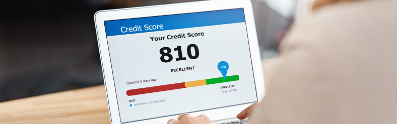 Credit card score displayed on laptop