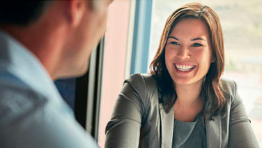 Woman smiling at colleague