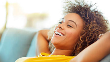 Woman resting her head while smiling