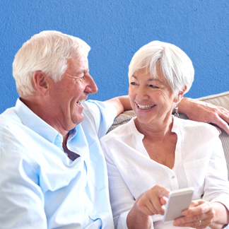 Mature couple smiling at each other