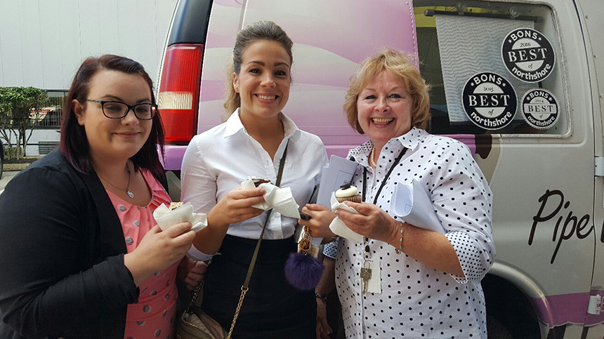 Salem Five employees enjoying cupcakes