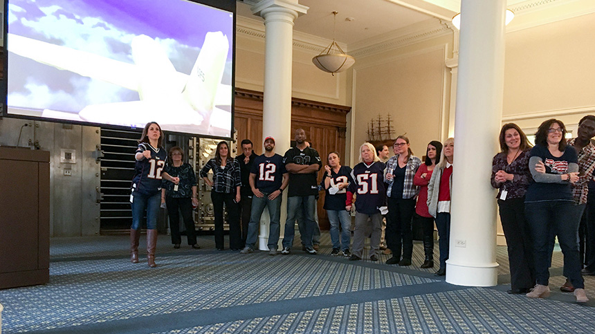 Salem Five employee wearing Patriot's shirts