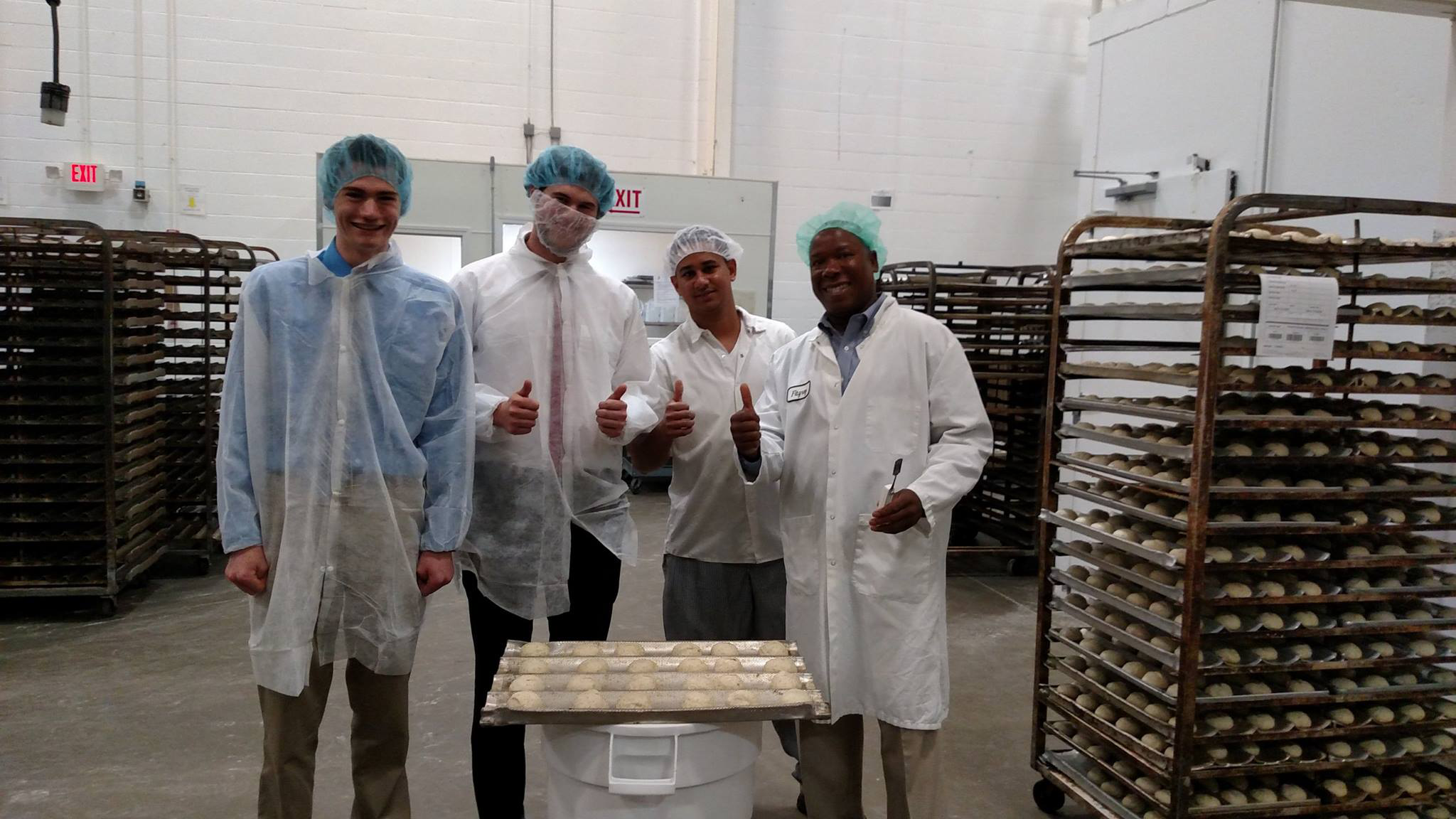 Salem Five interns working at a bakery