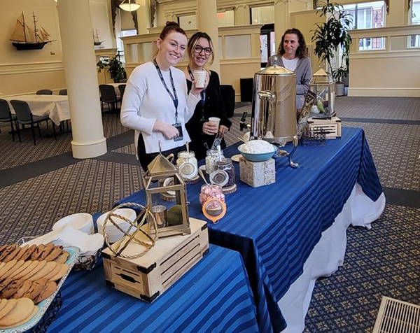 Smiling Salem Five employees enjoying hot cocoa day event