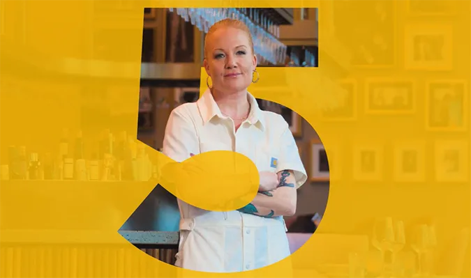 Person standing behind a bar in a restaurant setting with a large stylized number 5 overlay.